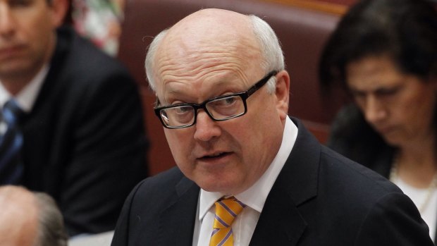 Backing down: Attorney-General George Brandis says Margaret Stone has performed a "valuable role".