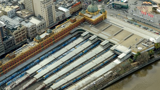 Trains parked at Flinders Street Station on Friday.