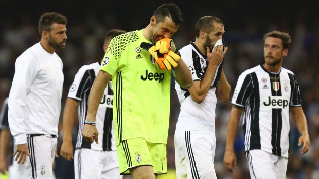 Sad end: Gigi Buffon and Giorgio Chiellini after the game.