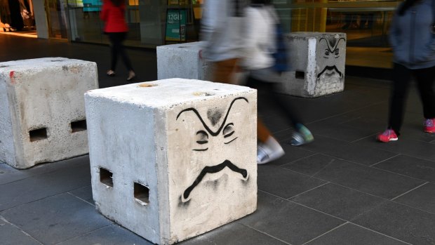 Melbourne's temporary bollards might not stop a car, experts fear.