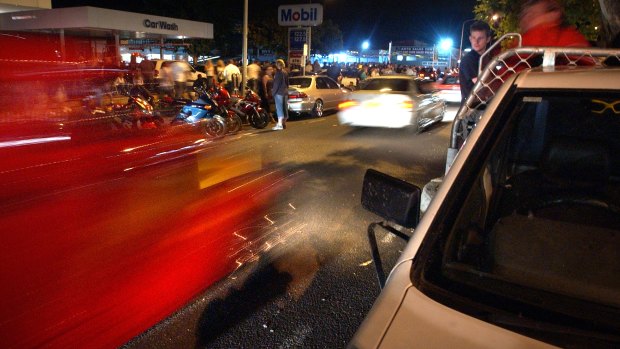 Big crowds turn out in Braddon to watch cruising cars during Summernats in 2005.