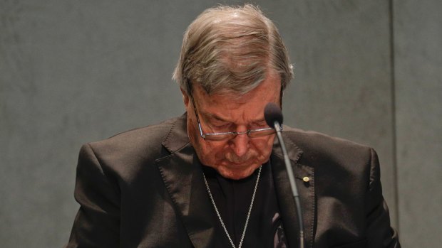 Cardinal Pell addresses the media at the Vatican.