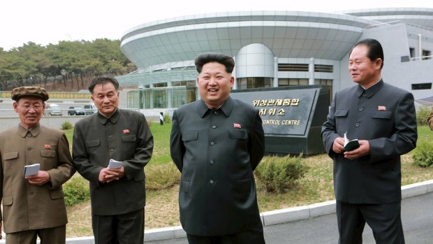 North Korean leader Kim Jong Un (second from right) at the newly built National Space Development General Satellite Control and Command Centre.
