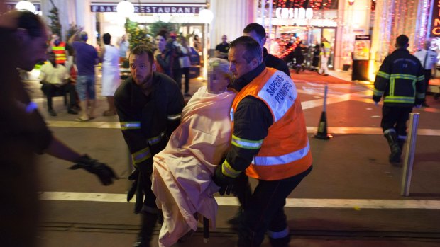 A victim is given medical assistance at Casino Du Palais De La Mediterranee, in Nice on Thursday.