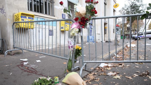 The scene outside the Bataclan theatre the morning after the attack.