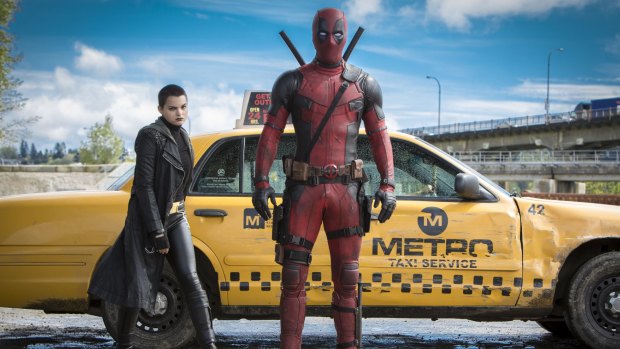 Morena Baccarin, left  and Ryan Reynolds in "Deadpool".