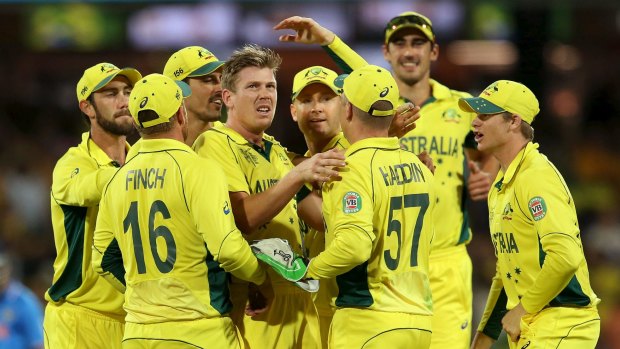 Happier times ... James Faulkner, centre, is congratulated during a World Cup match in March.