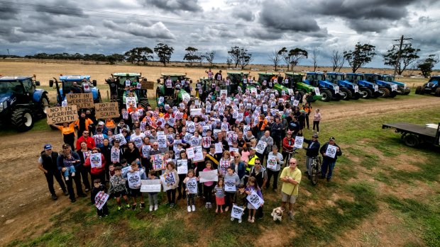 Farmers gather on Sunday on the site of the proposed Werribee South youth prison, ahead of a major protest planned for Monday night. 