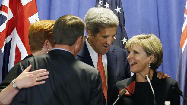 US Secretary of State John Kerry, second from right, stands with Australia's Foreign Minister Julie Bishop, right, US Secretary of Defence Ash Carter, second from left, and Australian Defence Minister Marise Payne, in Boston on Tuesday. 