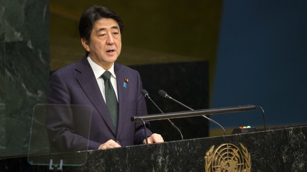 Japanese Prime Minister Shinzo Abe addresses the 2015 Sustainable Development Summit on Sunday at United Nations headquarters. 
