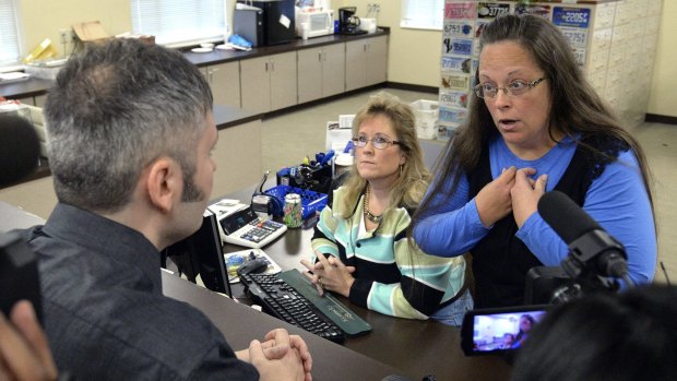 Rowan County clerk Kim Davis talks to David Moore. She has refused a request for a marriage licence for him and David Ermold.