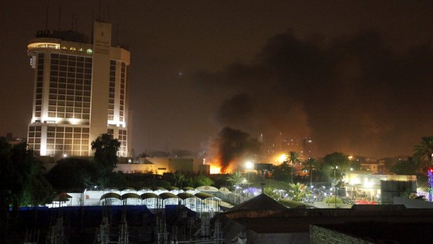 Car bombs exploded in the parking lots of two heavily fortified five-star hotels in central Baghdad on Thursday night.