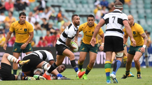 High time: Quade Cooper impressed with ball in hand but his tackling technique is coming under more and more scrutiny.