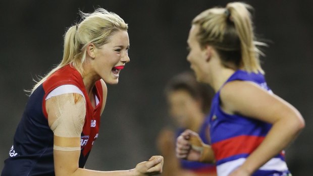 Tayla Harris of the Demons celebrates a goal during an exhibition game last year.