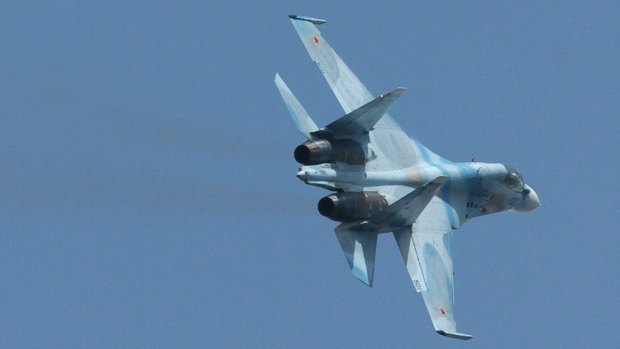 A Russian Sukhoi SU-30 fighter. In recent weeks, Russia has deployed more than two dozen fighter aircraft, attack helicopters and surface-to-air missile defence systems to a base in Syria, according to US officials.