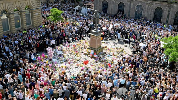 A minute's silence and a spontaneous rendition of Don't Look Back in Anger at St Ann's Square in Manchester.