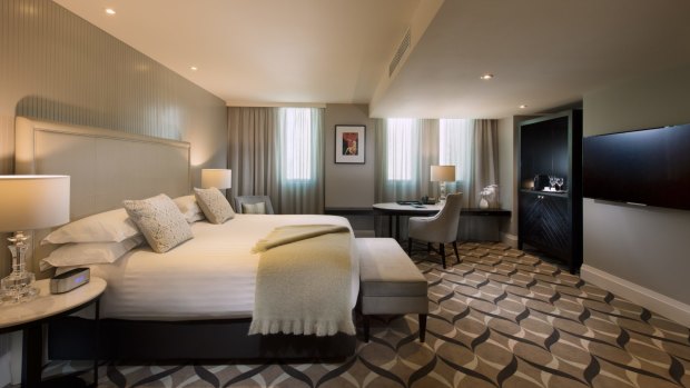 A Deluxe King Room at Mayfair Hotel Adelaide.