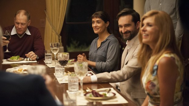 Salma Hayek (centre) is the righteous Beatriz, who stands out among her privileged dinner companions.