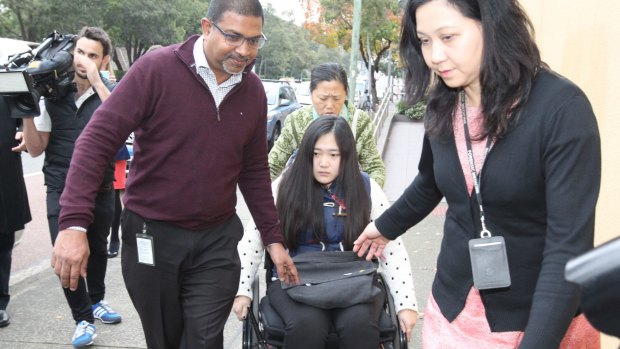  Yinuo "Ginger" Jiang, who broke both her legs when she jumped from her burning unit in Bankstown, at the Glebe Coroner's Court.