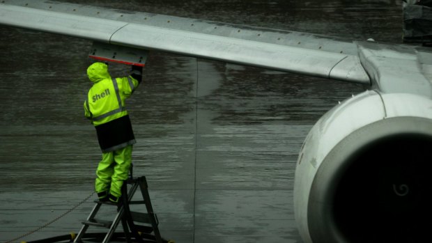 Qantas has forecast that its fuel bill will be lower this year but its passengers still face fuel surcharges.