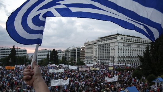 Anti-austerity protesters during a rally in front of the parliament in Athens on Sunday.