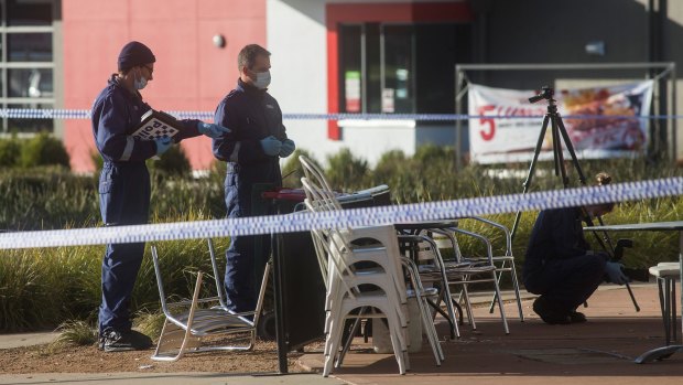 Forensic officers at work at the scene of a fatal stabbing in Caroline Springs.