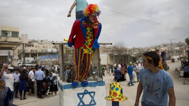 Israelis take part in a parade celebrating the Jewish holiday of Purim in Hebron in March.