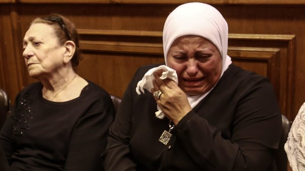 Friends and relatives of EgyptAir hostess Yara Hani mourn last month.