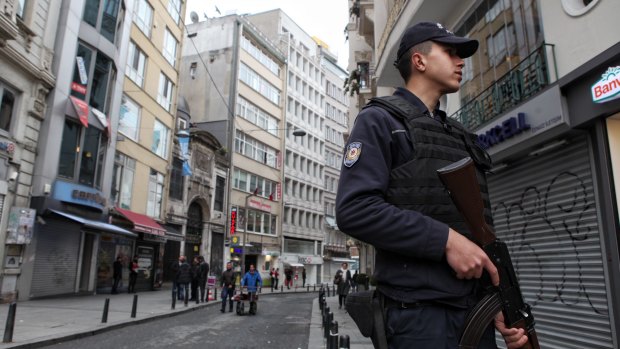 Police secure an area in a major shopping and tourist district in the central part of Istanbul following a suicide bombing on March 19.
