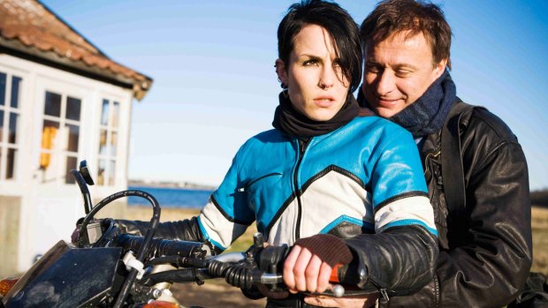 Noomi Rapace as Lisbeth Salander and Michael Nyqvist as Mikael Blomkvist in The Girl with the Dragon Tattoo.