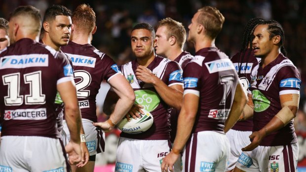 Outplayed: Manly players look shell-shocked during their defeat to Canterbury.
