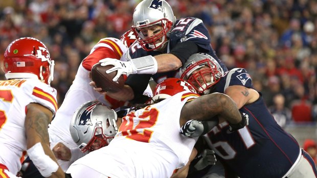 Tom Brady of the New England Patriots scores a touchdown in the win against the Kansas City Chiefs. 