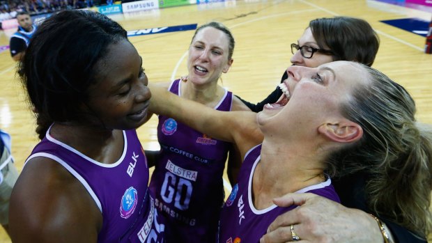 Back-to-back titles: Romelda Aiken and Laura Geitz celebrate.