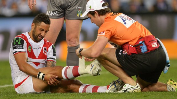 "It's broken": Benji Marshall receives treatment on the field.