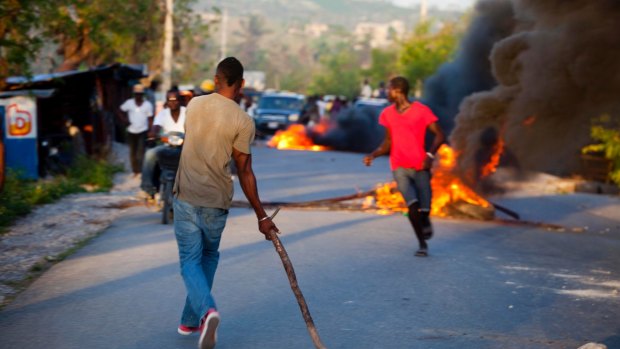 Protesters in Haiti in 2016. The US hopes to save money by scaling back its contribution to UN efforts there.