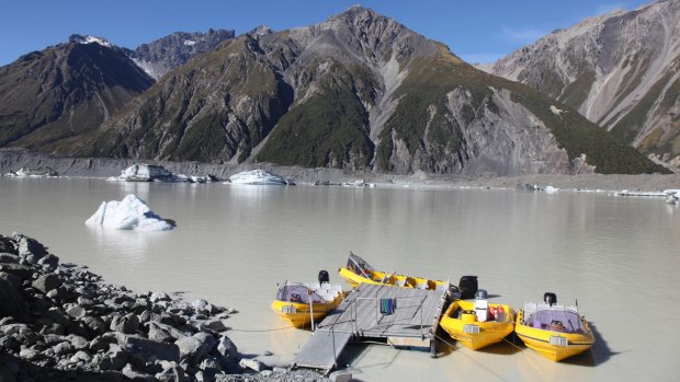 Tasman Lake is at the terminal of Tasman Glacier. The lake is one of the few in the world where tourists can cruise up close to icebergs formed from a glacier. 