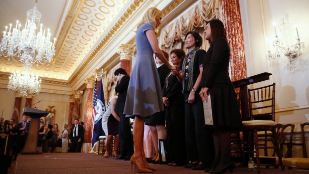 Ivanka Trump shakes hands with people honoured for their work to stop human trafficking including Allison Lee, of Taiwan, and Boom Mosby, of Thailand, right, during a 2017 Trafficking in Persons Report ceremony at the State Department, on Tuesday.
