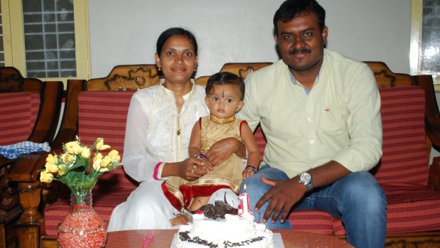 Padma Reddy, a Dalit, with and her husband Kishore Reddy on their daughter's first birthday.