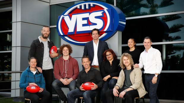 Supporting the 'yes' campaign: Meg Hutchins, Max Gawn, Ben Brown, Alastair Clarkson, Gillon McLachlan, Tanya Hosch, Dyson Heppell, Darcy Vescio and Hayden Kennedy at AFL House on Wednesday.