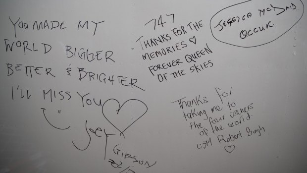 Farewell messages from Qantas staff signed on the underbelly of the 747.