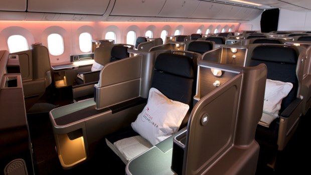 The Qantas 787 Dreamliner business class cabin. Qantas has seen a significant decline in business travellers and expects it to drop 13 per cent as professionals use online meeting services instead.