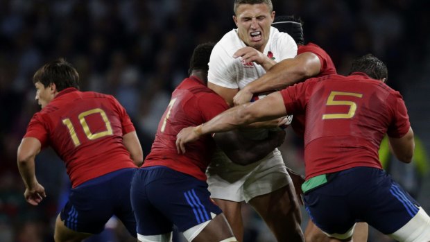 Ignoring the pong: England's Sam Burgess goes into contact at Twickenham last weekend.