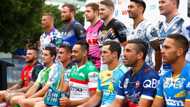 Fast and furious: John Sutton of the Rabbitohs holds the NRL Nines trophy at a captain's photoshoot in Auckland. 