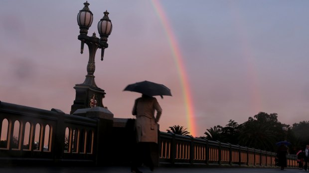Rainbow over Princes Bridge on a wet afternoon in Melbourne.