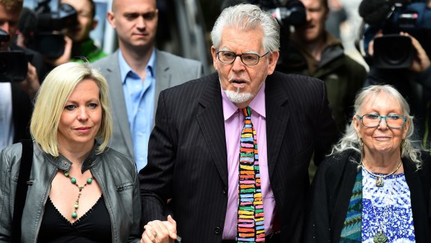 Rolf Harris with his daughter Bindi and wife Alwen Hughes at his trial in London in May.