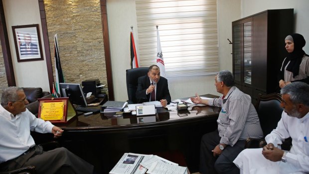The new mayor of Hebron, Tayseer Abu Sneineh, in his office last month.