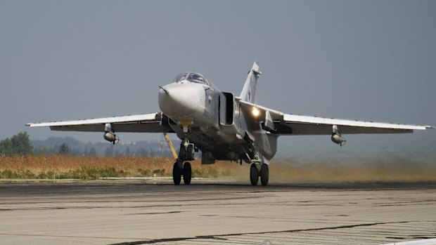 A Russian Su-24 takes off on a combat mission at Hemeimeem airbase in Syria in October.