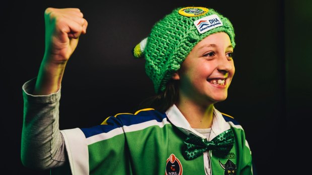Poppi Laine, 9, who has only missed one home game this season, at the Raiders Club Belconnen to cheer on the team.
