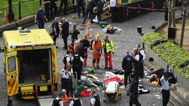 Emergency services at the scene outside the Palace of Westminster, London, Wednesday.