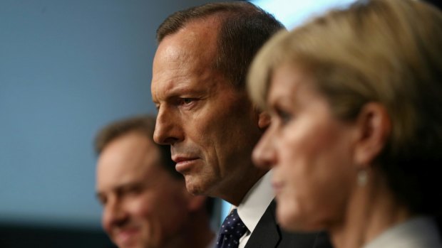 Prime Minister Tony Abbott during a joint press conference with Environment Minister Greg Hunt and Foreign Affairs Minister Julie Bishop at Parliament House in Canberra.